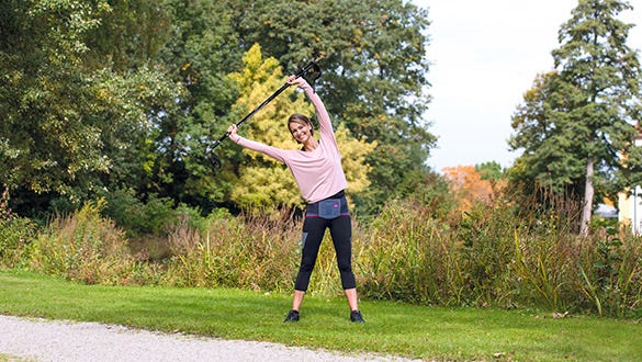 "Woman doing outside back strengthening exercises  while shwcasing her lumbamed back support