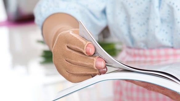 product shot of beige  mediven harmony compression arm sleeves and gloves 