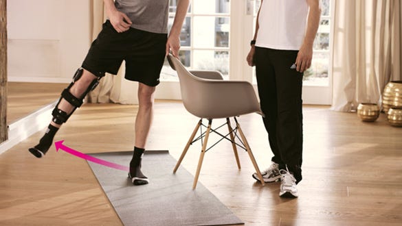 Lift leg sideways while standing, Exercise to strengthen the thigh muscles