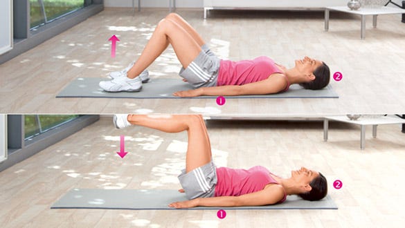 woman doing leg lifts to Strengthen her lower abdominal muscles and the hip flexors