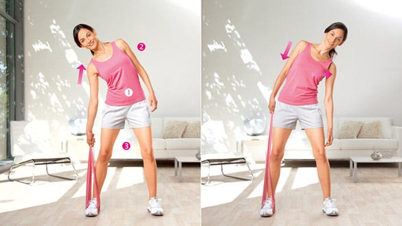 Woman doing side pull exercises to strenghten your lateral trunk muscles 