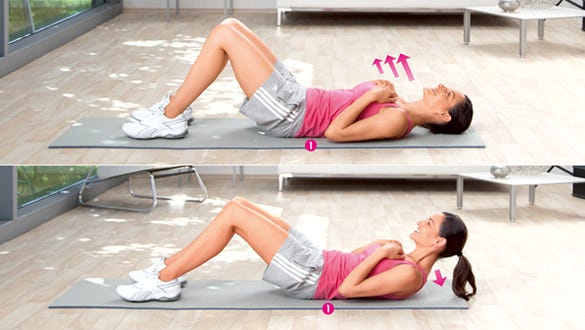 Woman doing sit ups to strenghten her upper abdominal muscles