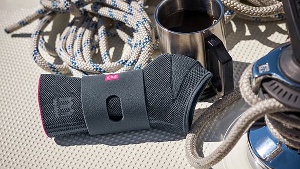 close up product shot of a medi wrist support with ropes in the background